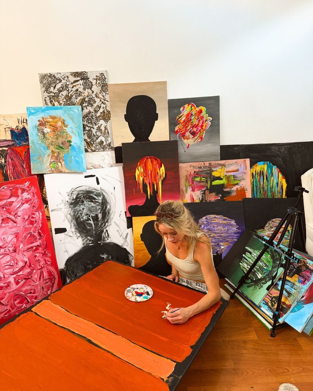 Stevie Alger painting in the studio